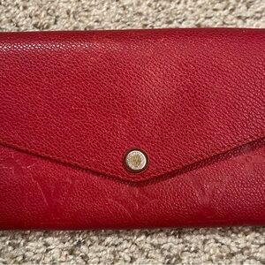Red Louis Vuitton wallet